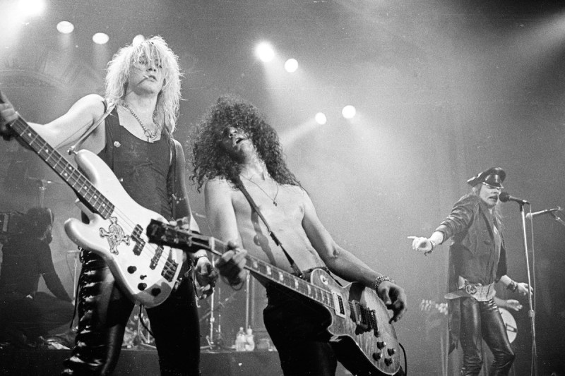 LOS ANGELES, CA - OCTOBER 27: Duff McKagan, Slash and Axl Rose of Guns 'n' Roses perform in concert at the Ritz on February 2, 1988 in New York City. (Photo by Larry Busacca/WireImage)