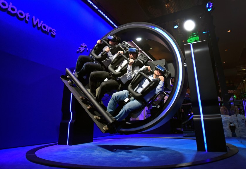 Attendees participate in a Samsung virtual reality ride at CES 2017 at the Las Vegas Convention Center on January 5, 2017 in Las Vegas, Nevada. CES, the world's largest annual consumer technology trade show, runs through January 8 and features 3,800 exhibitors showing off their latest products and services to more than 165,000 attendees. (David Becker/Getty Images)