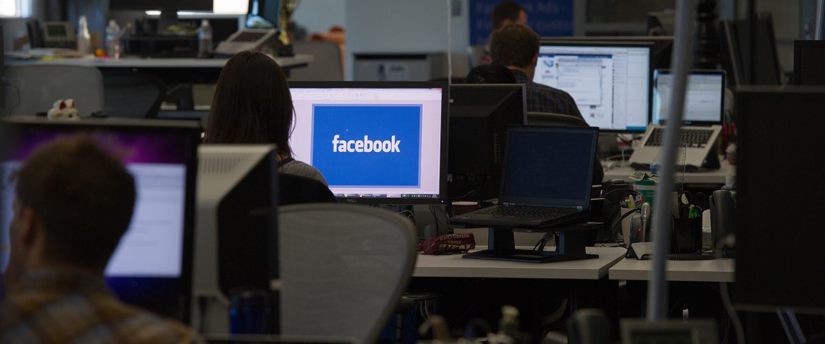 Facebook Inc. employees work at the company's new campus in Menlo Park, California, U.S. (David Paul Morris/Bloomberg via Getty Images)