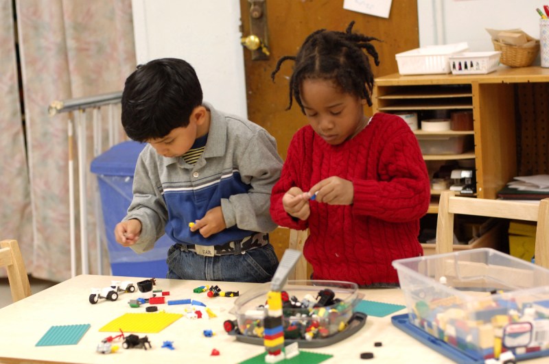 Four year olds playing with legos together at Marble Hill Nursery School (Michelle Del Guercio)