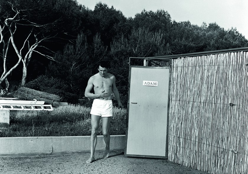 Rock Hudson on vacation at the Hotel Eden Roc at Cap d’Antibes, photographed in 1954. Until 1947 Hudson worked odd jobs. Finally, in 1954 with the film 'Magnificent Obsession,' he was accepted as an actor. In 1957 he was a nominee for an Oscar for 'Giant.' (Riviera Cocktail, Edward Quinn - Côte d'Azur Jet Set of the 1950s, Small Format Edition, to be published by teNeues)