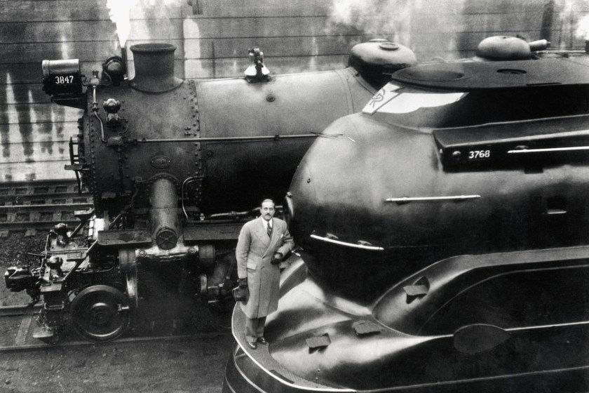 (Original Caption) 3/3/36: Doctor Raymond Loewy with his latest designed locomotive.