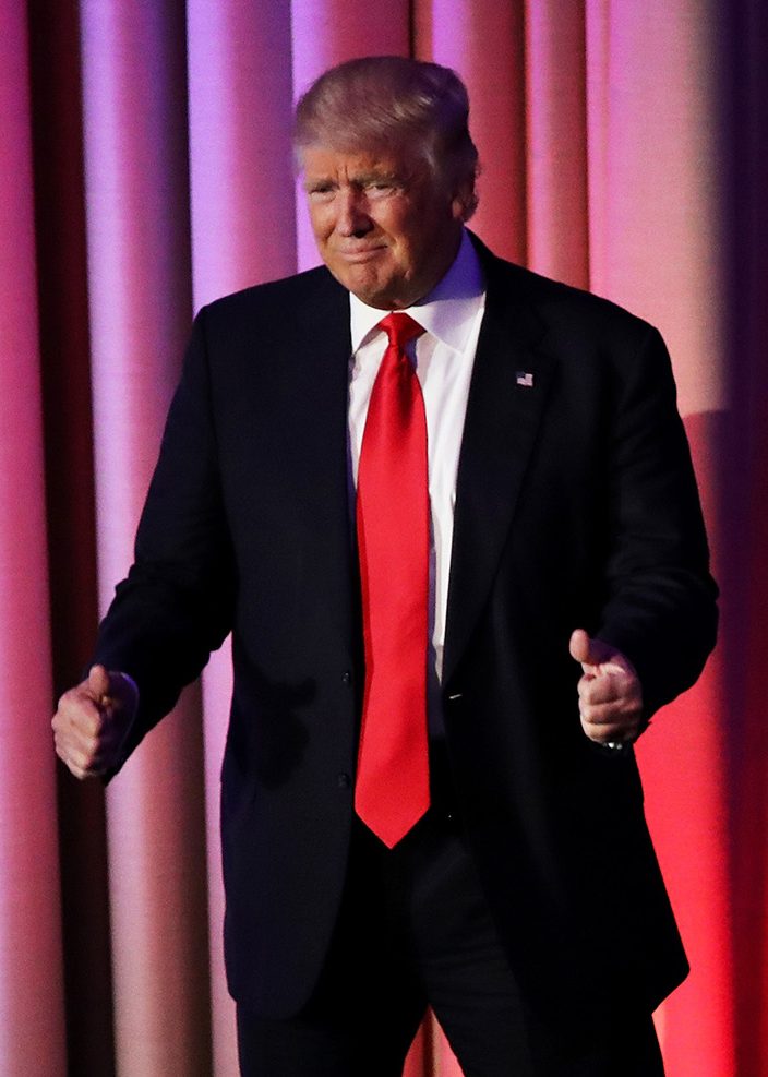 NEW YORK, NY - NOVEMBER 09:  Republican president-elect Donald Trump gives two thumbs up to the crowd during his election night event at the New York Hilton Midtown in the early morning hours of November 9, 2016 in New York City. Donald Trump defeated Democratic presidential nominee Hillary Clinton to become the 45th president of the United States.  (Photo by Joe Raedle/Getty Images)