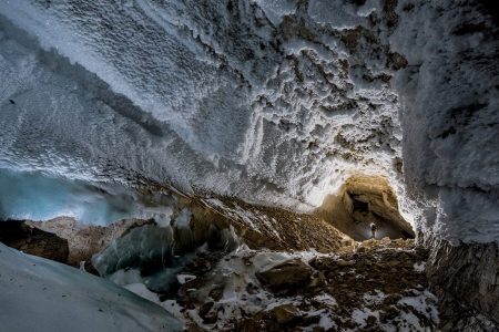 Ice crystals populate Full Moon Hall. The chamber, 820 feet long, is the largest yet discovered in Dark Star. The entire cave system is a geological time capsule: Mineral deposits reveal millennia of climate history. (Robbie Shone/National Geographic)