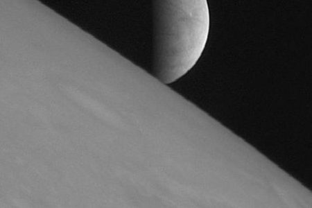 The icy moon Europa rising above Jupiter's cloud tops (NASA/Johns Hopkins University Applied Physics Laboratory/Southwest Research Institute)