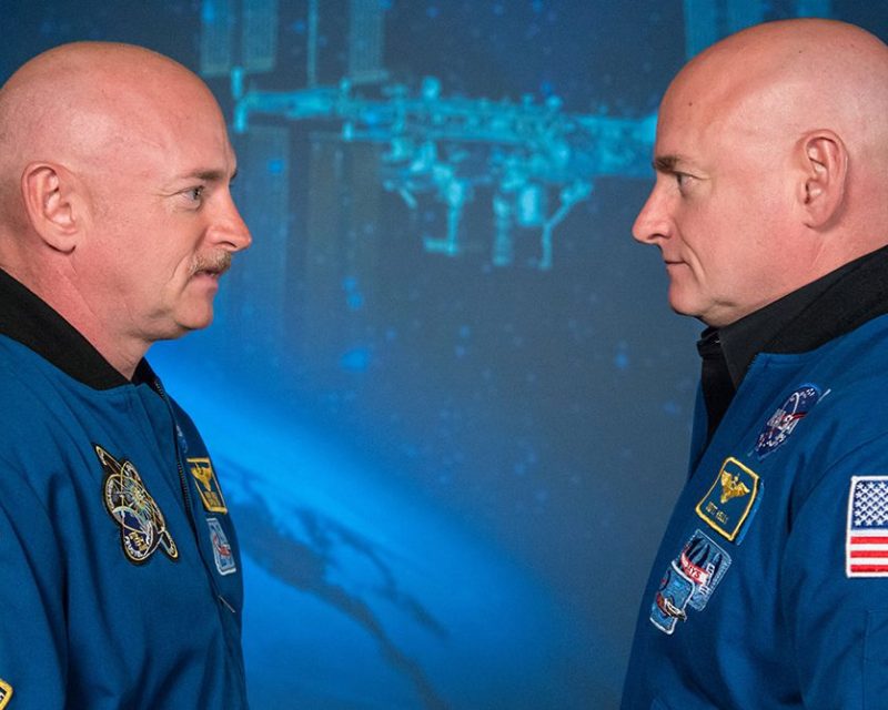 Expedition 45/46 Commander, Astronaut Scott Kelly along with his brother, former Astronaut Mark Kelly speak to news media outlets about Scott Kelly's 1-year mission aboard the International Space Station. Photo Date: January 19, 2015. Location: Building 2. (Robert Markowitz/NASA)