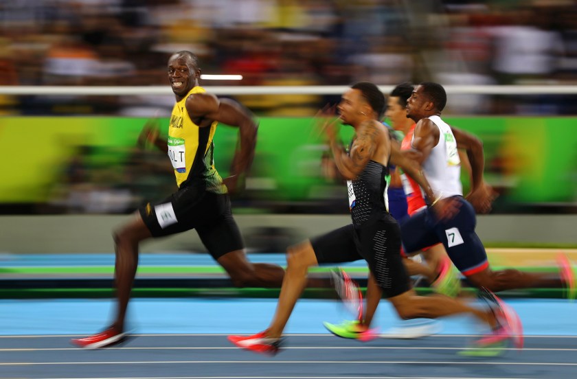 Sports - Third Prize, Singles: Usain Bolt of Jamaica smiles as he looks back at his competition, whilst winning the 100-meter semi-final sprint, at the 2016 Olympics in Rio de Janeiro, Brazil. Bolt is regarded as the fastest human ever timed. He is the first person to hold both the 100-meter and 200-meter world records since fully automatic time became mandatory. (Kai Oliver Pfaffenbach/Thomson Reuters)