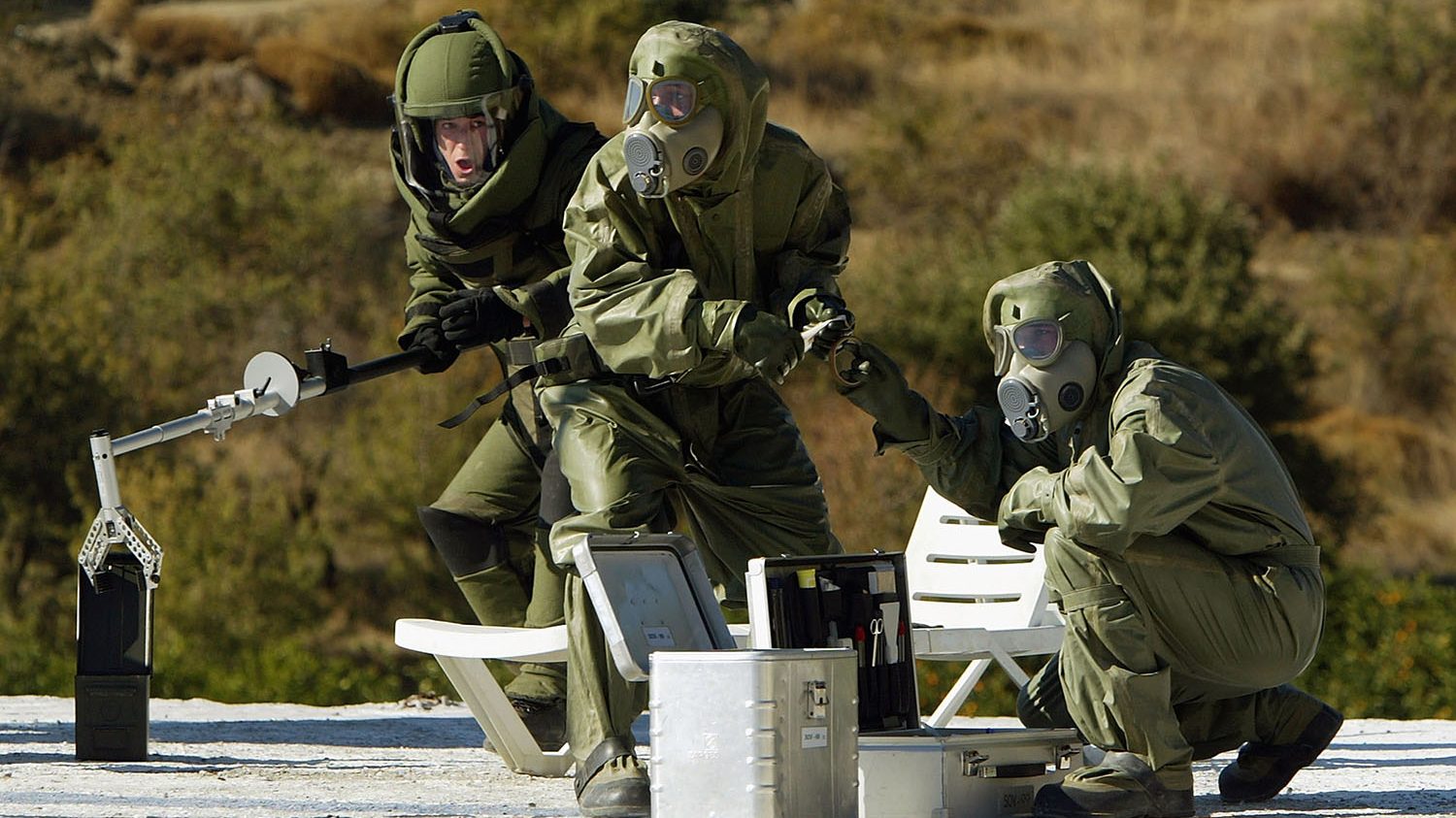 Members of the Czech Nuclear, Biological and Chemical Defense Team take part in the NATO Response Force demonstration on the exercise field November 20, 2003 in Doganbey, Turkey. (Scott Barbour/Getty Images)