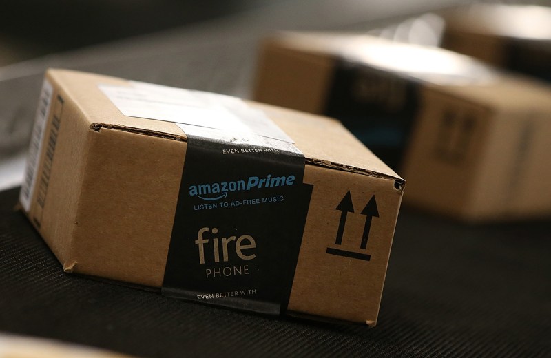 TRACY, CA - JANUARY 20: Boxes move along a conveyor belt at an Amazon fulfillment center on January 20, 2015 in Tracy, California. Amazon officially opened its new 1.2 million square foot fulfillment center in Tracy, California that employs more than 1,500 full time workers as well as 3,000 Kiva robots that can fetch merchandise for workers and are capable of lifting up to 750 pounds. Amazon is currently using 15,000 of the robots spread over 10 fulfillment centers across the country. (Photo by Justin Sullivan/Getty Images)