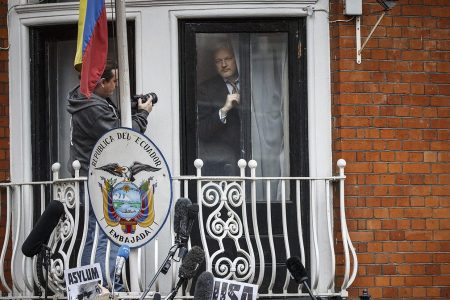 Wikileaks founder Julian Assange prepares to speak from the balcony of the Ecuadorian embassy where he continues to seek asylum following an extradition request from Sweden in 2012, on February 5, 2016 in London, England. The United Nations Working Group on Arbitrary Detention has insisted that Mr Assange's detention should be brought to an end. (Tolga Akmen/Anadolu Agency/Getty Images)