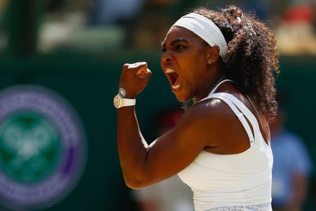 Serena Williams of the United States celebrates winning a point in the Final Of The Ladies' Singles against Garbine Muguruza of Spain during day twelve of the Wimbledon Lawn Tennis Championships at the All England Lawn Tennis and Croquet Club on July 11, 2015 in London, England.  (Julian Finney/Getty Images)