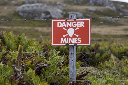 A warning sign marking one of the areas on the Falkland Islands still not cleared of mines planted by the Argentinian forces during the invasion of 1982. (Getty Images)