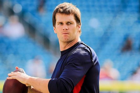 Tom Brady #12 of the New England Patriots warms up before the game against the Miami Dolphins at Sun Life Stadium on January 3, 2016 in Miami Gardens, Florida. (Photo by Mike Ehrmann/Getty Images)