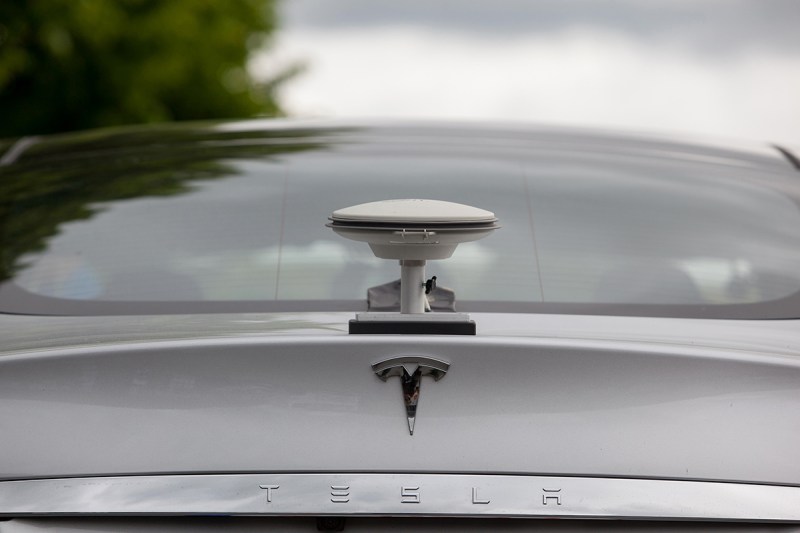 A GPS driving sensor antennae sits on the back of a Tesla Motors Inc. (Krisztian Bocsi/Bloomberg via Getty Images)