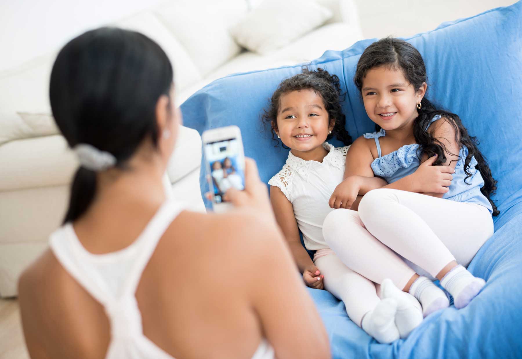 Kids have strong opinions about what their parents share. (Getty Images)