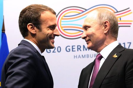 French President Emmanuel Macron (L) and Russian President Vladimir Putin meet during the G20 Summit on July 8, 2017 in Hamburg, Germany. The leaders were reportedly to talk the about climate change and issues surrounding the Ukraine. (Photo by Mikhail Svetlov/Getty Images)