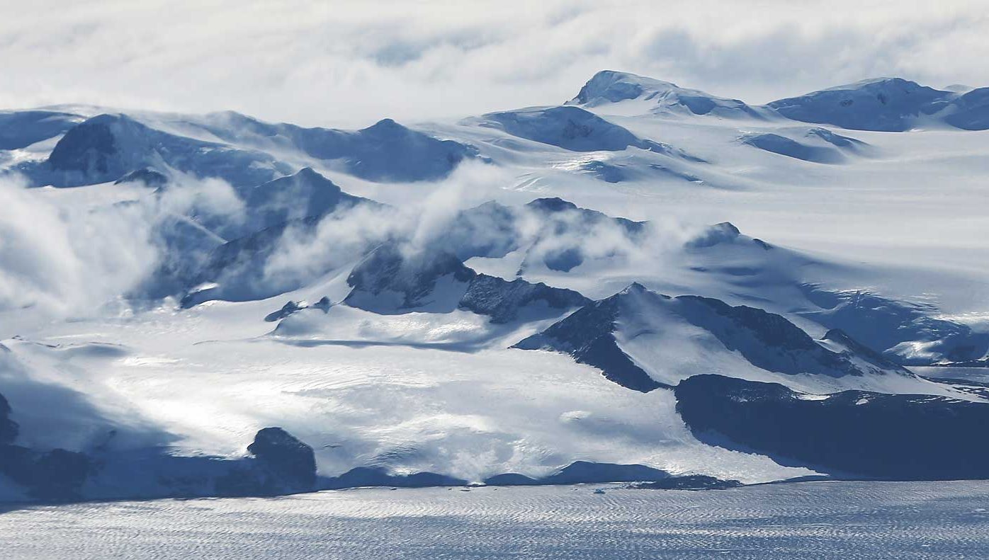 Mountains stand near the coast of West Antarctica as seen from a window of a NASA Operation IceBridge airplane on October 27, 2016 in-flight over Antarctica. (Mario Tama/Getty Images)