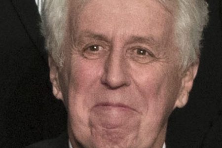 In this Dec. 15, 2016, photo, CNN commentator Jeffrey Lord, appears at a rally for President-elect Donald Trump in Hershey, Pa. Lord made a comparison of Trump to Martin Luther King Jr., on CNN's morning "New Day." He is one of a handful of pro-Trump commentators that CNN hired during the last election.