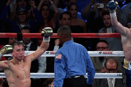 (L-R) "GGG" Gennady Golovkin and "Canelo" Alvarez both celebrate after the final round in their middleweight championship bout on September 16, 2017 in Las Vegas, Nevada.  (Ethan Miller/Getty Images)