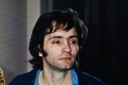 Charles Manson clean-shaven in closeup photo. (Getty Images)