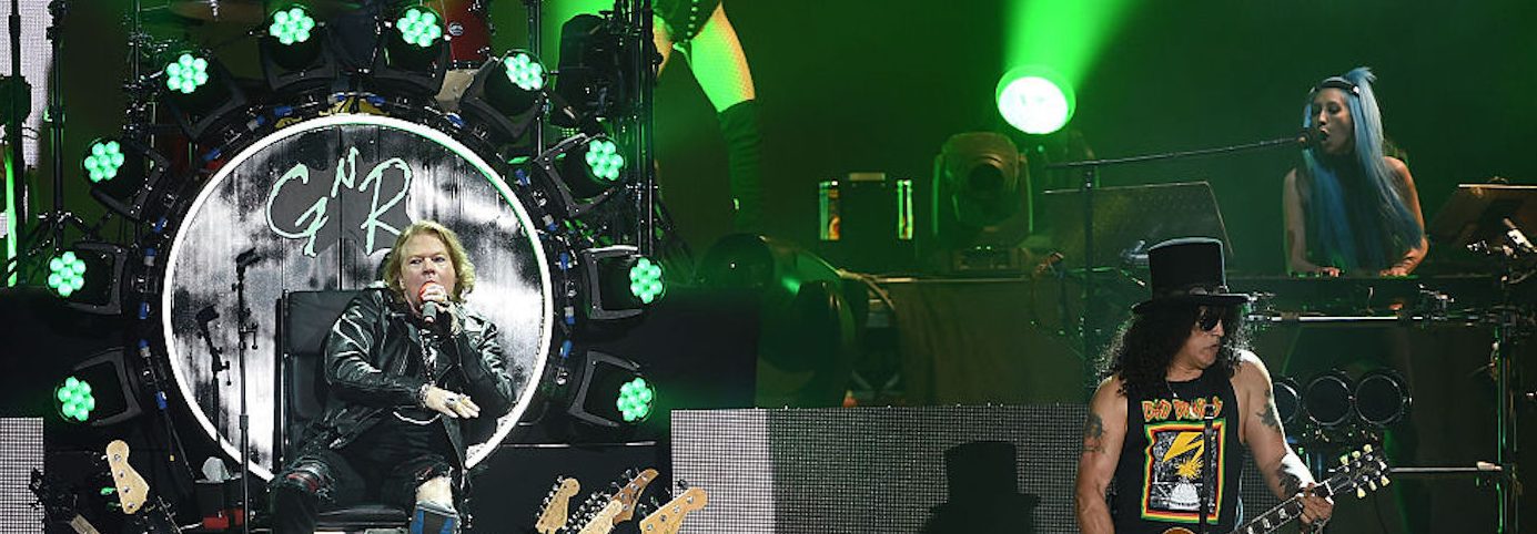 INDIO, CA - APRIL 23:  Musicians Axl Rose, Slash and Melissa Reese of Guns N' Roses perform onstage during day 2 of the 2016 Coachella Valley Music & Arts Festival Weekend 2 at the Empire Polo Club on April 23, 2016 in Indio, California.  (Photo by Kevin Winter/Getty Images for Coachella)