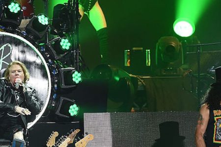 INDIO, CA - APRIL 23:  Musicians Axl Rose, Slash and Melissa Reese of Guns N' Roses perform onstage during day 2 of the 2016 Coachella Valley Music & Arts Festival Weekend 2 at the Empire Polo Club on April 23, 2016 in Indio, California.  (Photo by Kevin Winter/Getty Images for Coachella)