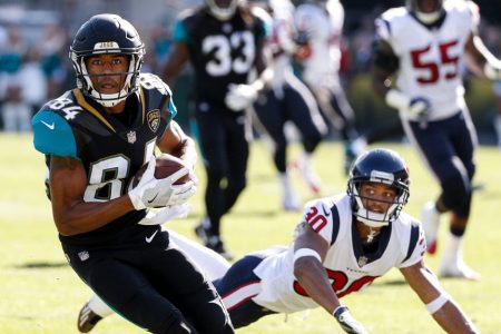 Wide Receiver Keelan Cole #84 of the Jacksonville Jaguars makes a catch over Cornerback Kevin Johnson #30 of the Houston Texans during the game at EverBank Field on December 17, 2017 in Jacksonville, Florida. (Don Juan Moore/Getty Images)