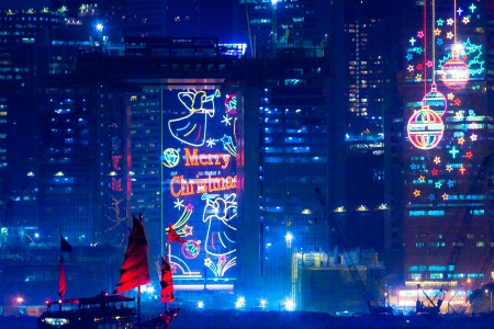 Christmas decorations on the facades of the high rises of Hong Kong Island. (Getty Images)