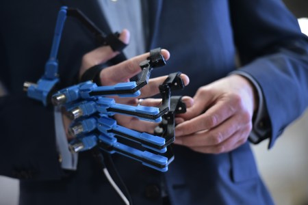 Prince Constantijn of the Netherlands wears a virtual reality controller glove during the official opening of the Holland Startup Pavillion in the Sands convention hall during CES 2018 in Las Vegas on January 9, 2018. (MANDEL NGAN/AFP/Getty Images)