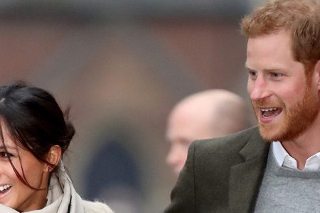 Prince Harry (R) and his fiancee Meghan Markle