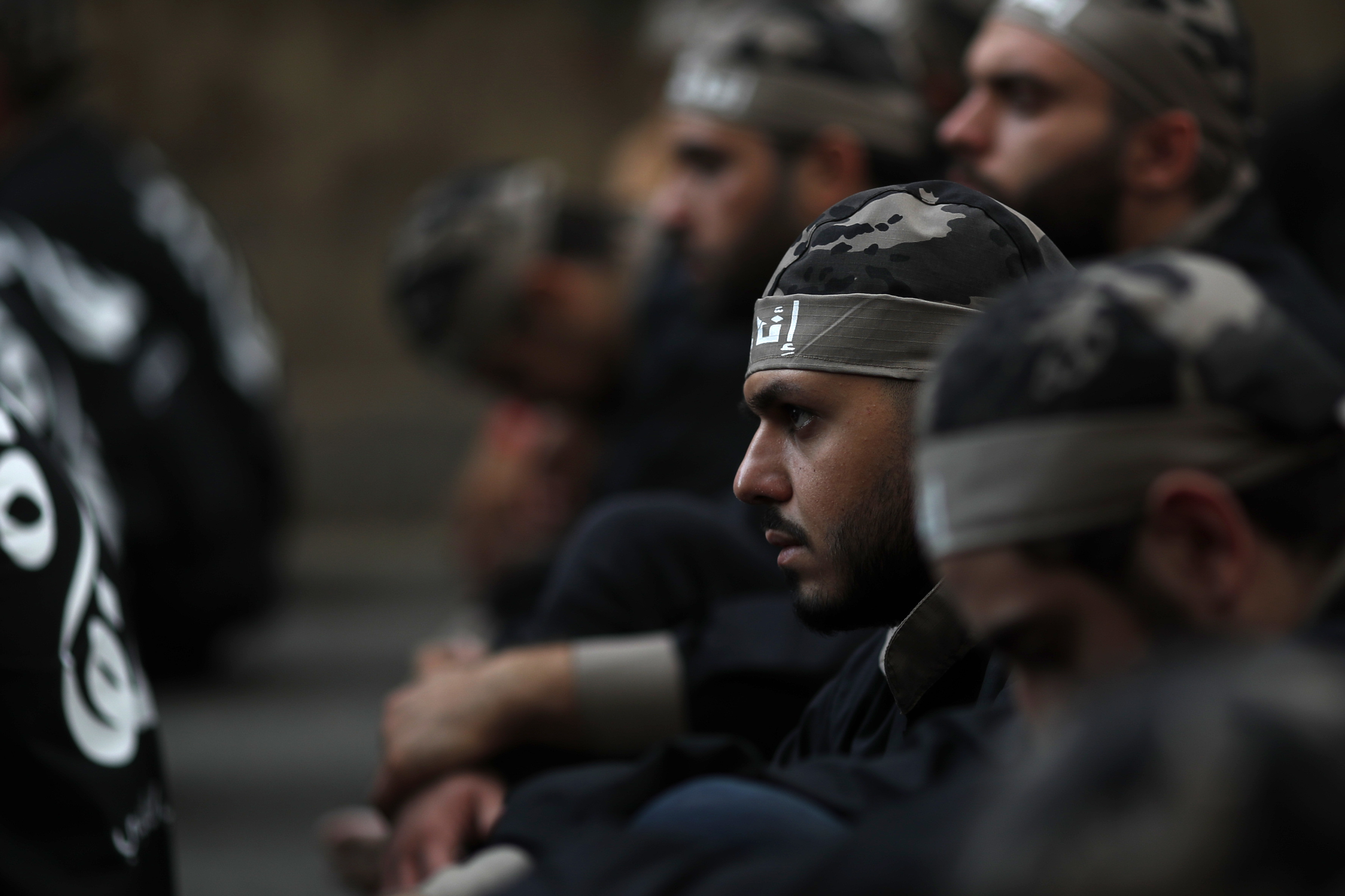 Lebanese Shiite supporters of Hezbollah listen to the story of Imam Hussein, during activities marking the holy day of Ashoura, in southern Beirut, Lebanon, Sunday, Oct. 1, 2017. Ashoura is the annual Shiite Muslim commemoration marking the death of Imam Hussein, the grandson of the Prophet Muhammad, at the Battle of Karbala in present-day Iraq in the 7th century. (AP Photo/Hassan Ammar)