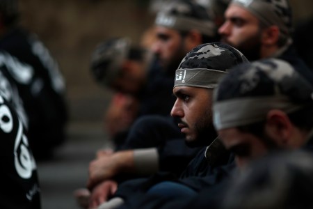 Lebanese Shiite supporters of Hezbollah listen to the story of Imam Hussein, during activities marking the holy day of Ashoura, in southern Beirut, Lebanon, Sunday, Oct. 1, 2017. Ashoura is the annual Shiite Muslim commemoration marking the death of Imam Hussein, the grandson of the Prophet Muhammad, at the Battle of Karbala in present-day Iraq in the 7th century. (AP Photo/Hassan Ammar)