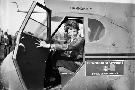 Pilot Amelia Earhart poses for a portrait in and airplane in circa 1936. (Library of Congress/Getty Images)