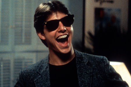 Tom Cruise laughs in a scene from the film 'Risky Business', 1983. (Warner Brothers/Getty Images)