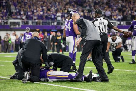 Andrew Sendejo #34 of the Minnesota Vikings is evaluated by trainers on the field after suffering an injury in the third quarter of the NFC Divisional Playoff game against the New Orleans Saints on January 14, 2018 at U.S. Bank Stadium in Minneapolis, Minnesota. Sendejo was later ruled out for the game with a concussion. (Photo by Adam Bettcher/Getty Images)