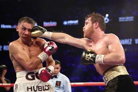 During arguably boxing's biggest fight of 2018, Canelo Alvarez punches Gennady "GGG" Golovkin during their
WBC/WBA middleweight title fight at T-Mobile Arena on September 15, 2018 in Las Vegas, Nevada. (Al Bello/Getty Images)