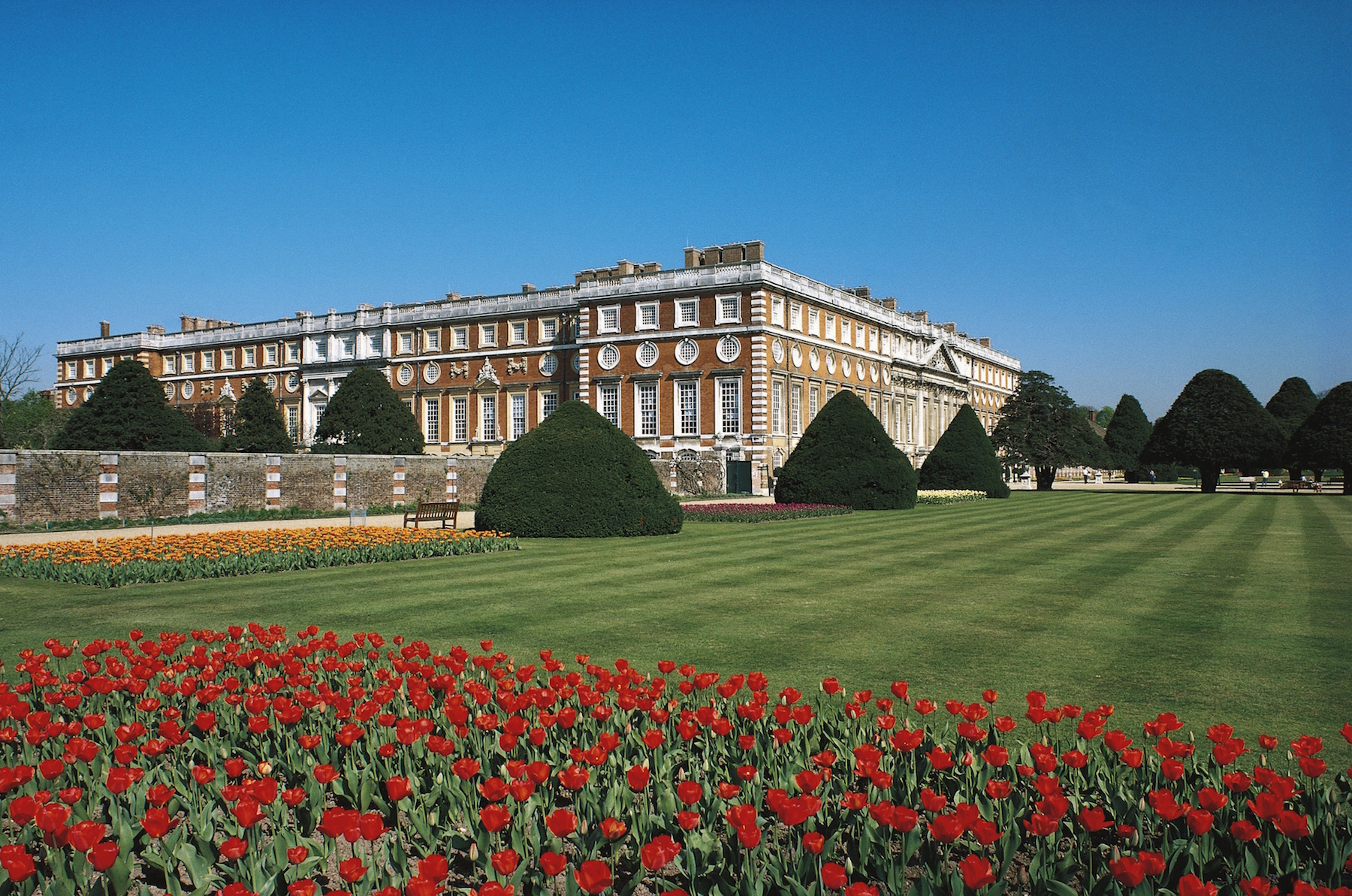 View of Hampton Court, the south facade on the right, Richmond upon Thames, London, England, United Kingdom. Hampton Court Palace will soon host an overnight event. (DEA / G. WRIGHT / Contributor)