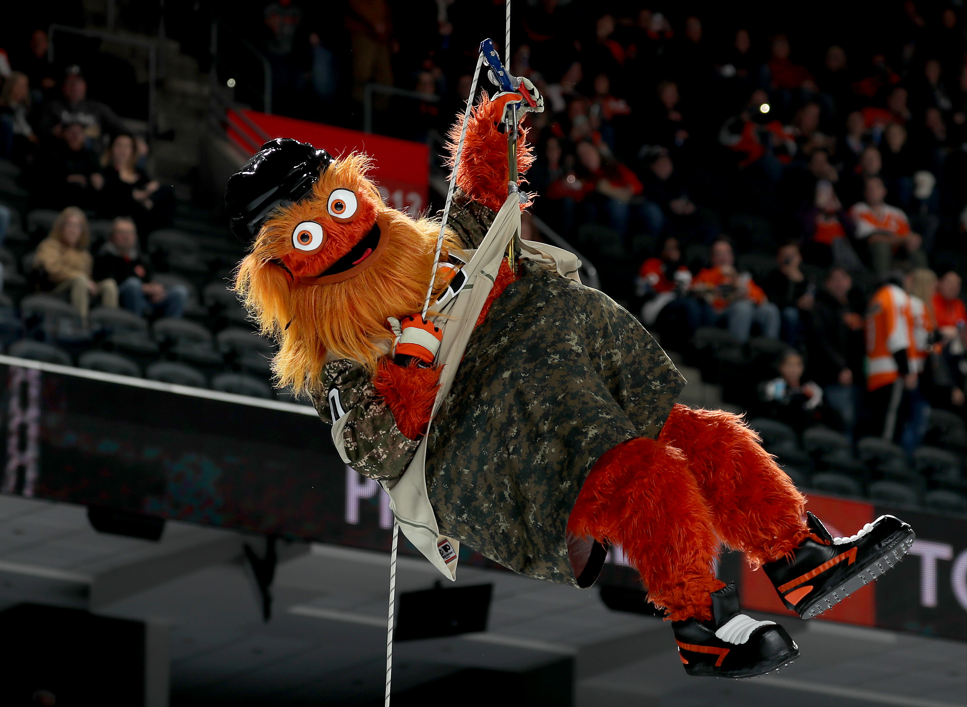 PHILADELPHIA, PENNSYLVANIA - NOVEMBER 10:   The Philadelphia Flyers mascot Gritty makes an entrance before the game between the Philadelphia Flyers and the Chicago Blackhawks at Wells Fargo Center on November 10, 2018 in Philadelphia, Pennsylvania. (Photo by Elsa/Getty Images)