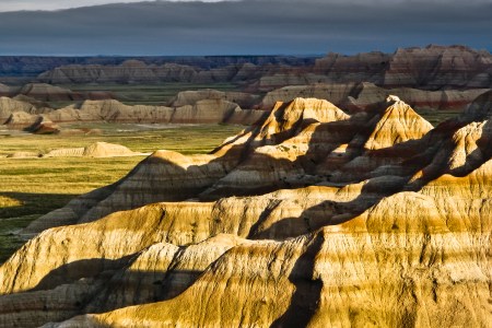 Distant clouds made for interesting background against a lightened foreground.  Morning sunrise shadows added a little extra to the mood.  Badlands National Park. Finalist in The Nature Conservancy's 2010, 5th Annual Digital Photo Contest (Getty)