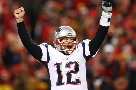 Tom Brady #12 of the New England Patriots celebrates after defeating the Kansas City Chiefs in overtime during the AFC Championship Game at Arrowhead Stadium on January 20, 2019 in Kansas City, Missouri. The Patriots defeated the Chiefs 37-31. (Photo by Ronald Martinez/Getty Images)