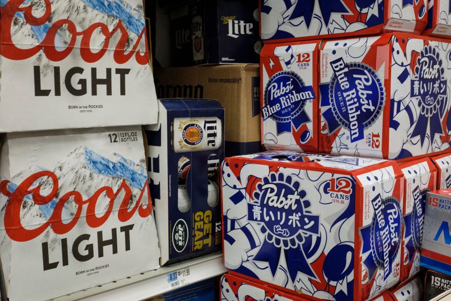 Packs of beer sit for sale at a convenience store. (Drew Angerer/Getty Images)