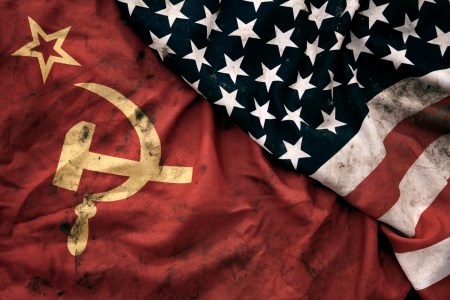 Soviet Union and United States of America flags. (Getty)