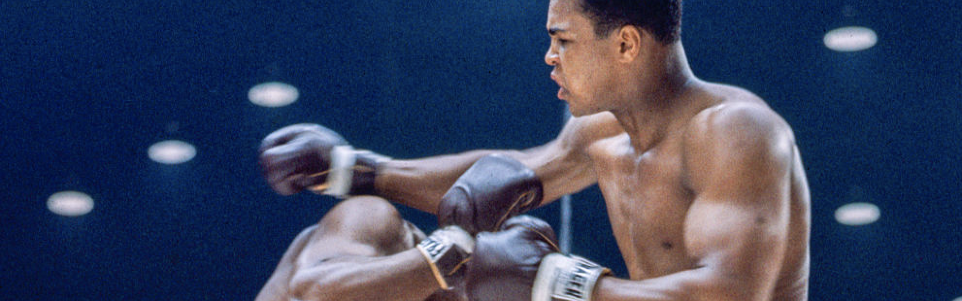 MIAMI BEACH, FL - FEBRUARY 25: Sonny Liston (left) dodges a right hook by Cassius Clay during their bout at the Convention Center in Miami Beach, Florida, February 25, 1964. Cassius Clay won the World Heavyweight Title by RTD in round 6 of 15. (Photo by Stanley Weston/Getty Images)