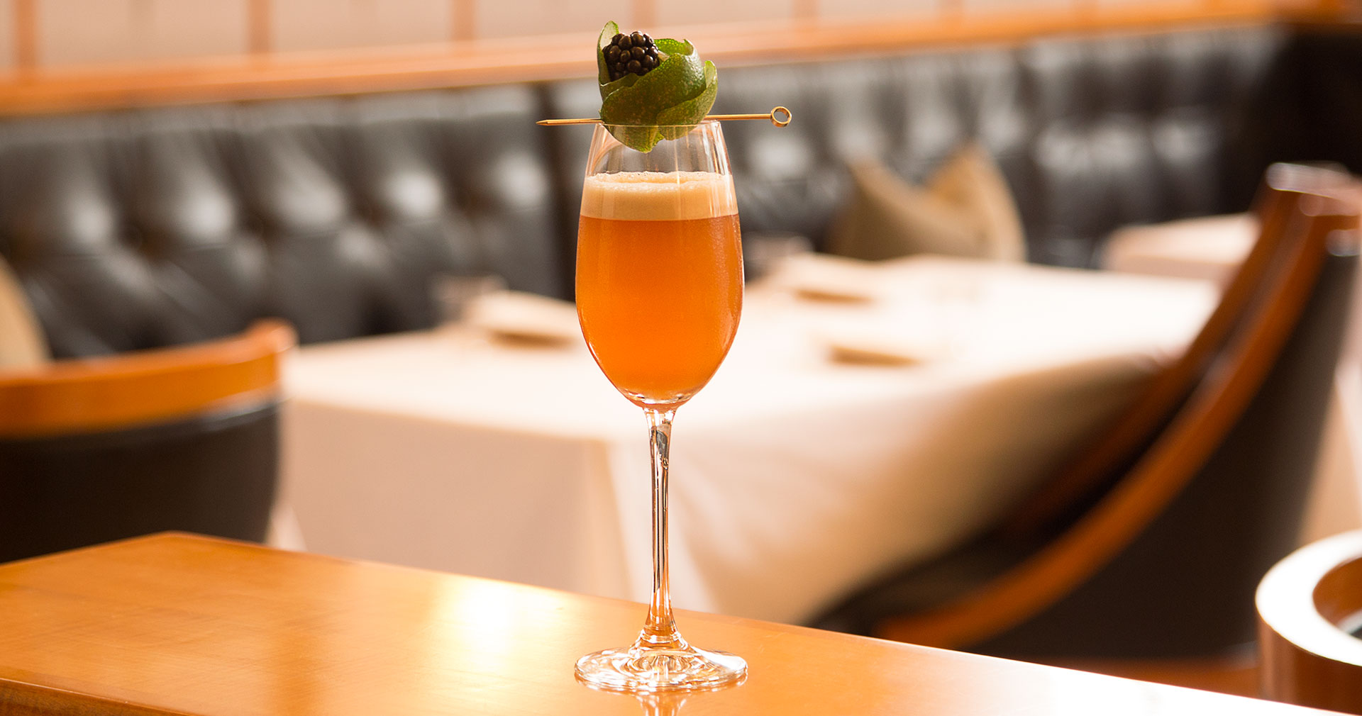 A high-end orange alcoholic beverage