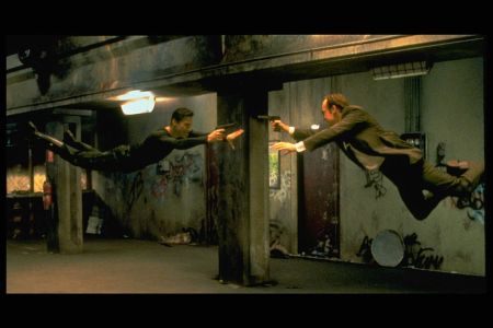 Keanu Reeves and Hugo Weaving in scene from "The Matrix." 