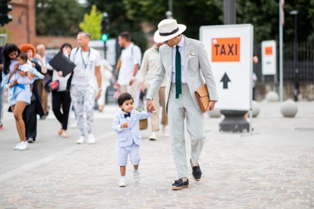 That kid is already an icon thanks to his dad. (Photo by Christian Vierig/Getty Images)