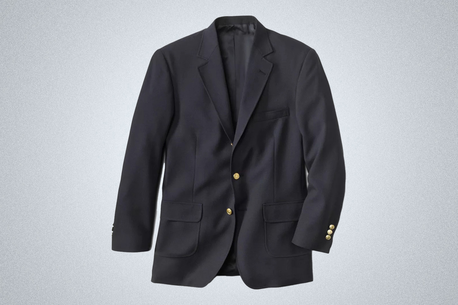 a navy Orvis travel blazer on a grey background