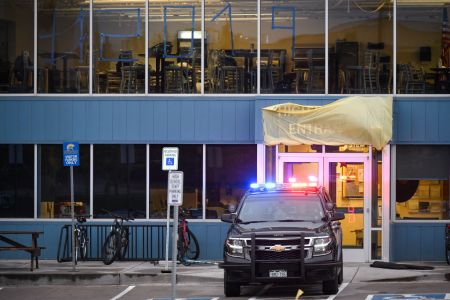 HIGHLANDS RANCH, CO - MAY 08: A police vehicle sits in front of an entrance to the STEM School Highlands Ranch on May 8, 2019 in Highlands Ranch, Colorado, one day after a shooting there killed one student and injured eight others. Two students were taken into custody following the shooting. (Photo by Michael Ciaglo/Getty Images)