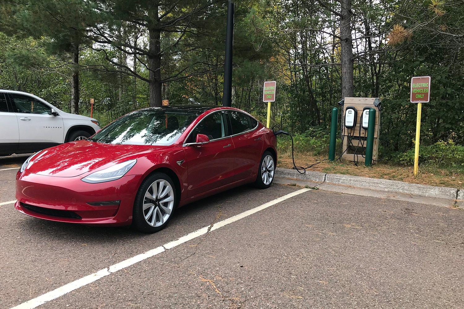 Tesla Model 3 charging at a state park