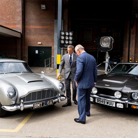 Aston Martin DB5 and V8 with James Bond's Daniel Craig and Prince Charles